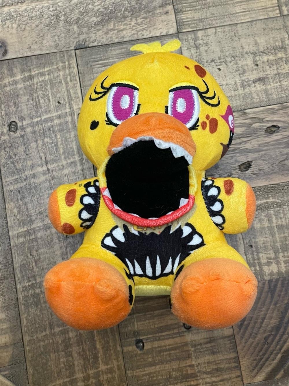 Twisted Ones Chica plush toy from the Five Nights at Freddy's franchise.